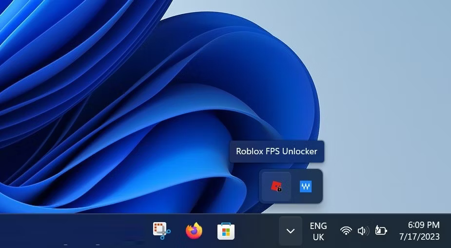 Roblox FPS Unlocker red lock icon in the Windows system tray